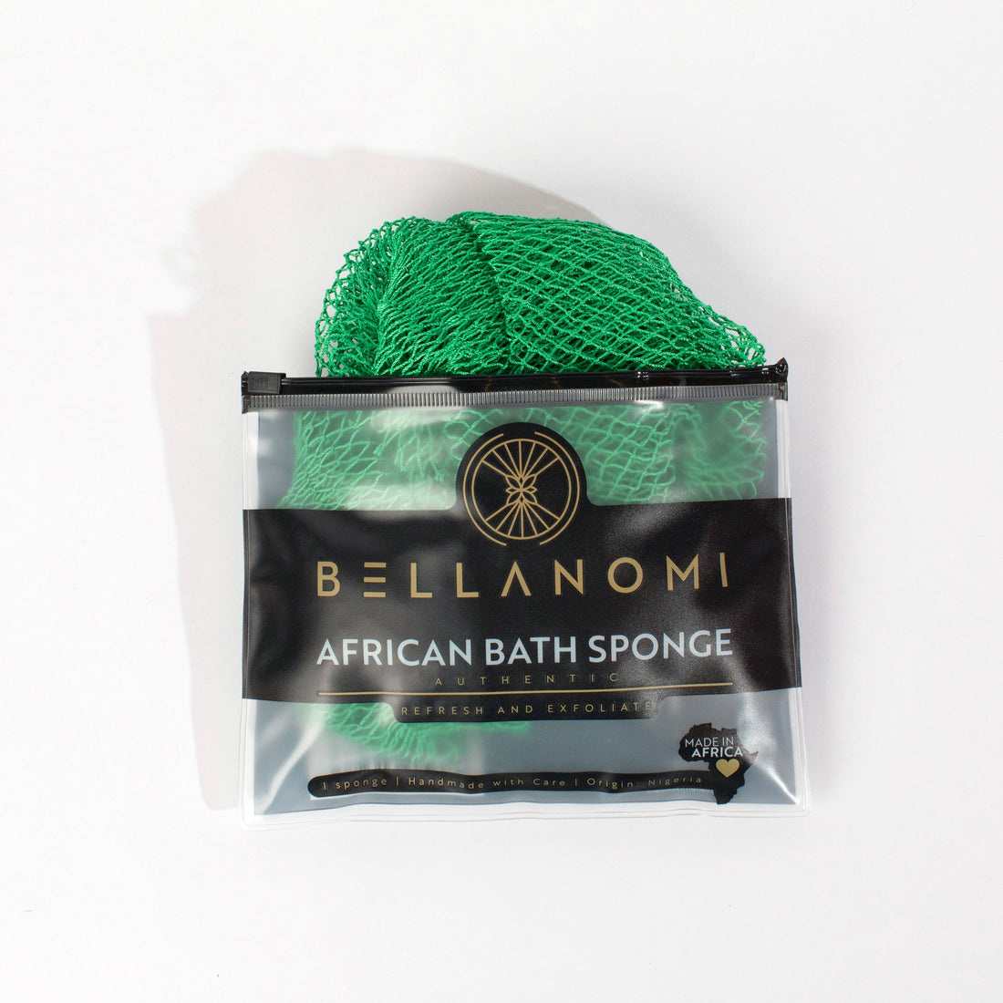 Green bath sponge in packaging with &