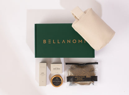 Bellanomi skincare products including a green box, cream, and towel on a white background