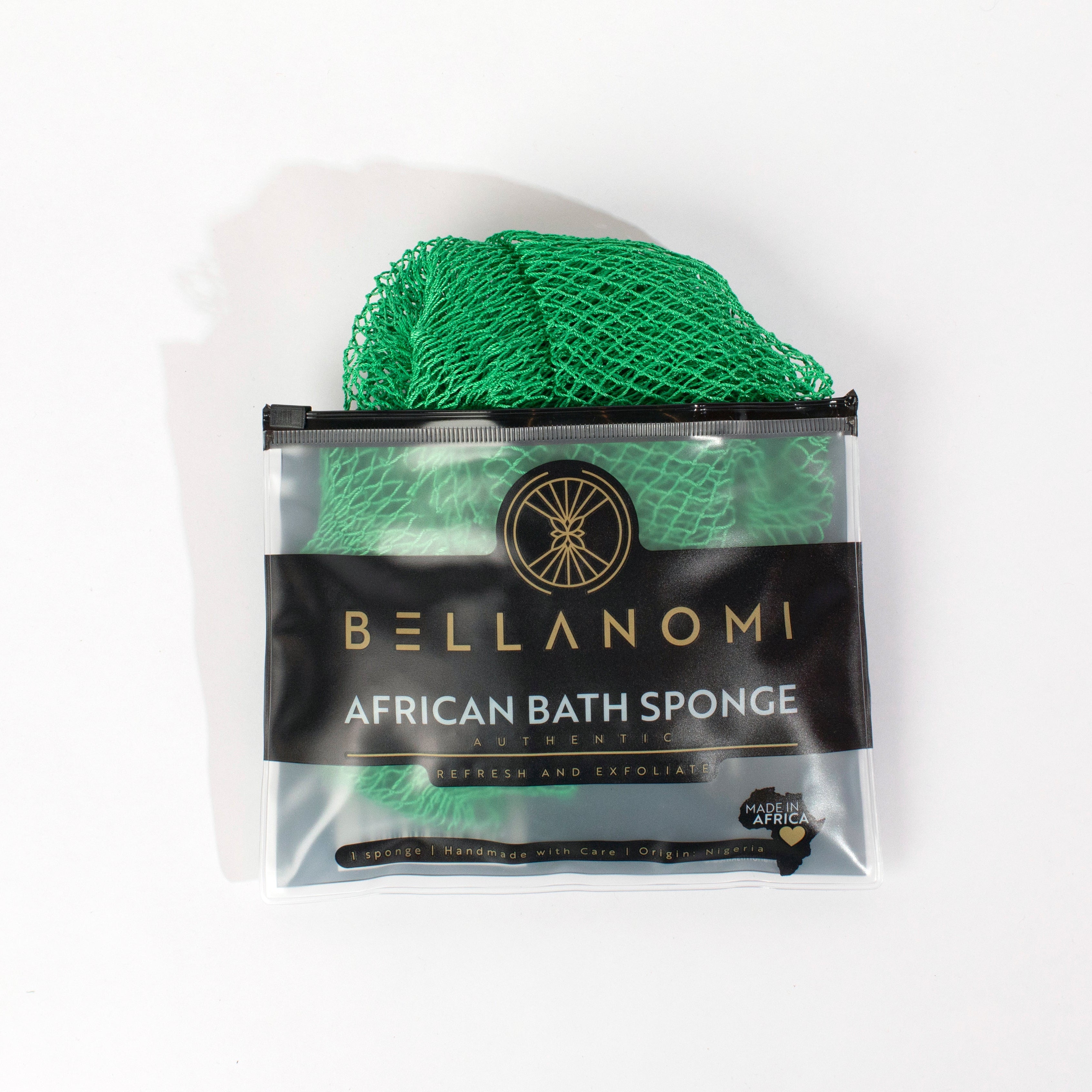 Green bath sponge in packaging with &