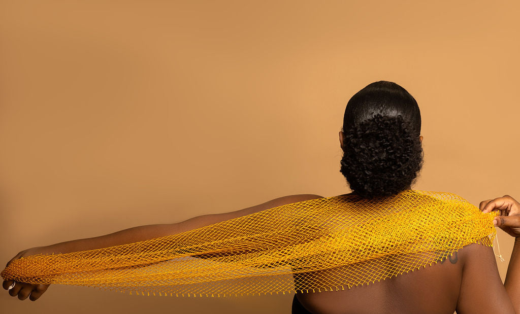 Traditional African bath sponge, known as sapo sponge, for deep cleansing and exfoliation.